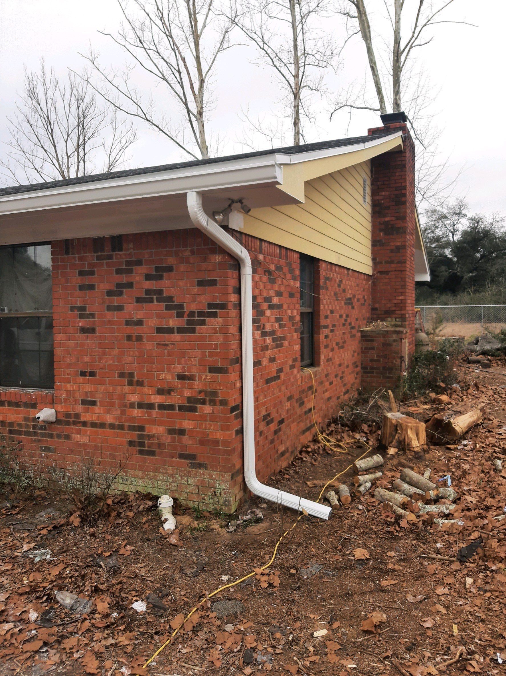Gutter Installation using White Seamless Gutters by Gutter Professors