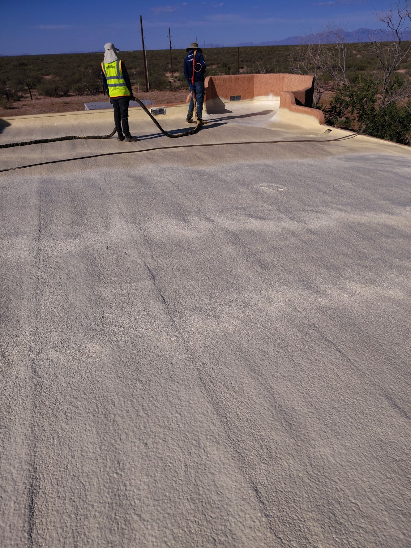 Residential roof application by SPF Services 