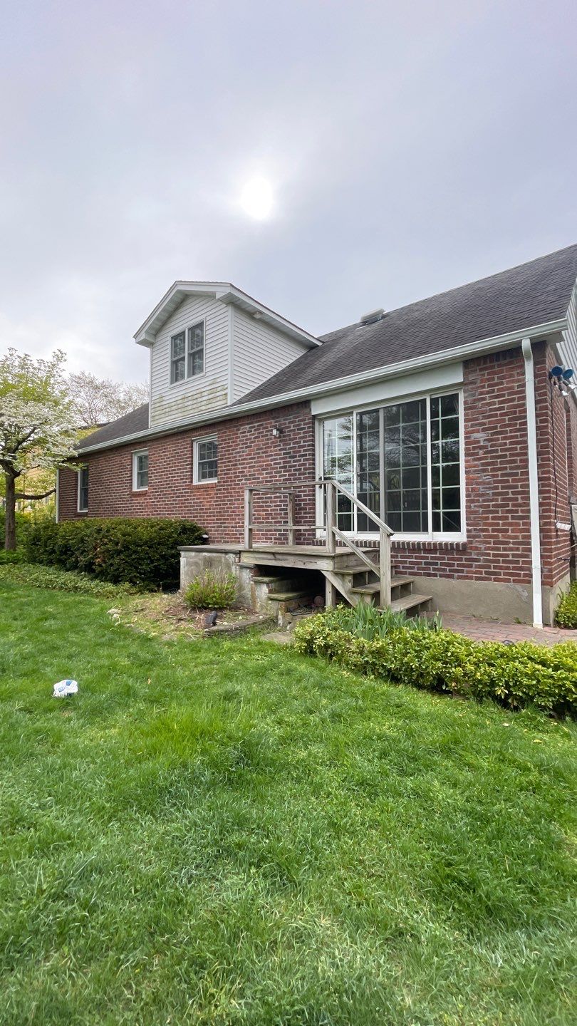 Gutter Installation using 5"white K style seamless gutters and 2x3 white leaders by Above All Gutters 