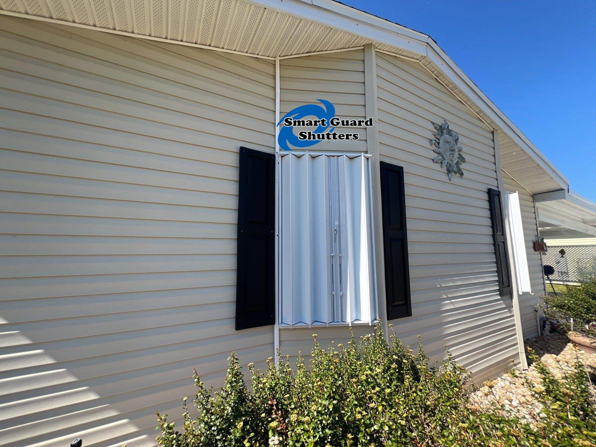 Accordion Shutters & Hurricane Fabric by Smart Guard Shutters