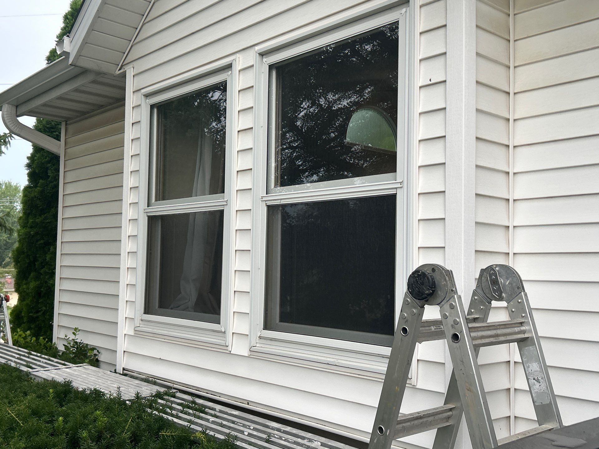 Upgrade Your Home with Pella 250 Series White Vinyl Windows by United Windows and Siding LLC