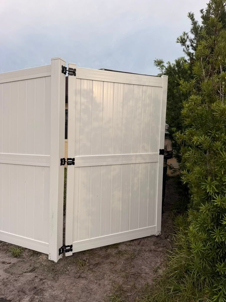 8'H White Vinyl Privacy Fence Installation in North Port by True Fence LLC