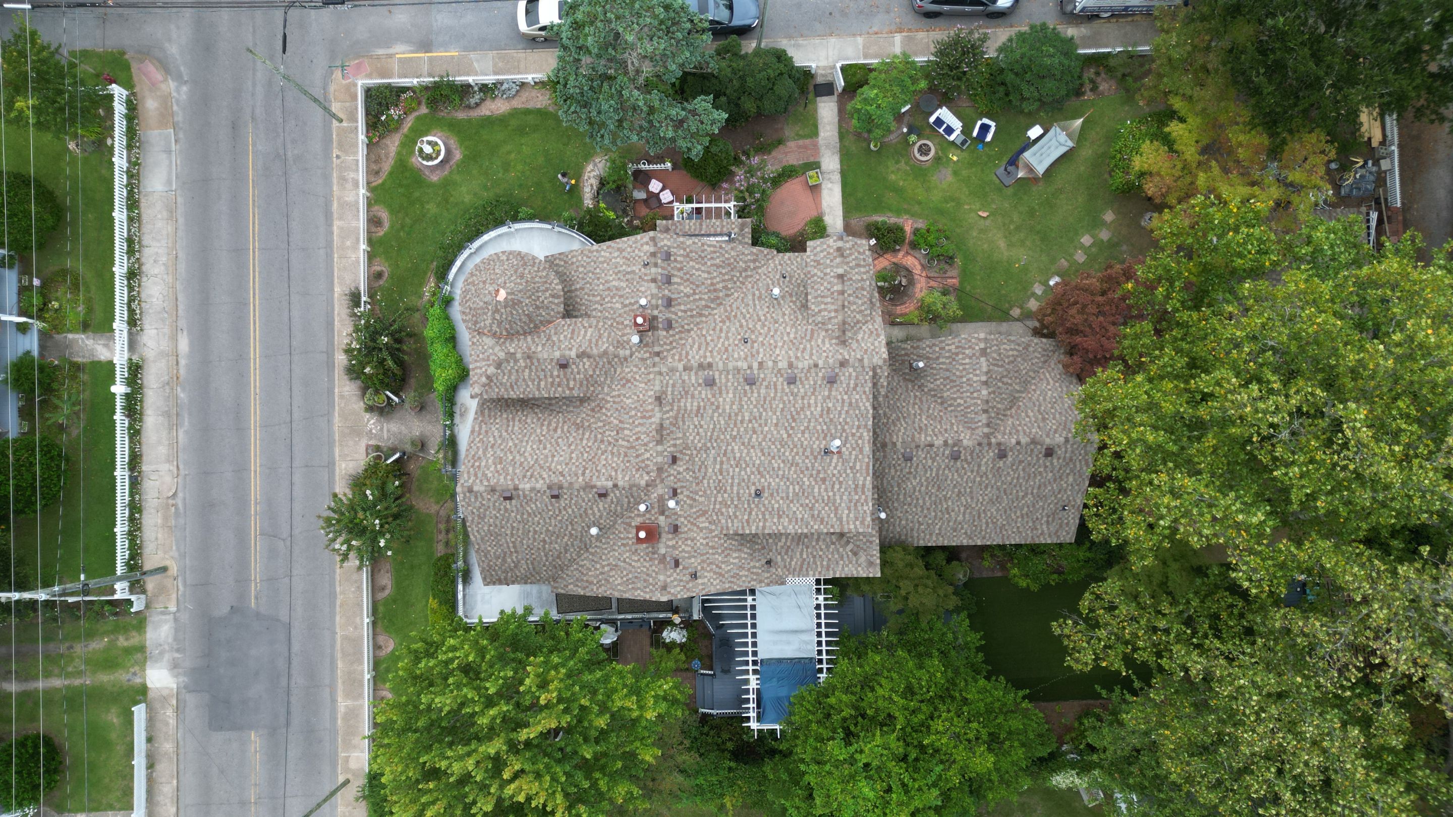 Shingle Roof Transformation on Historic Inn by Gallop Roofing & Remodeling, Inc.