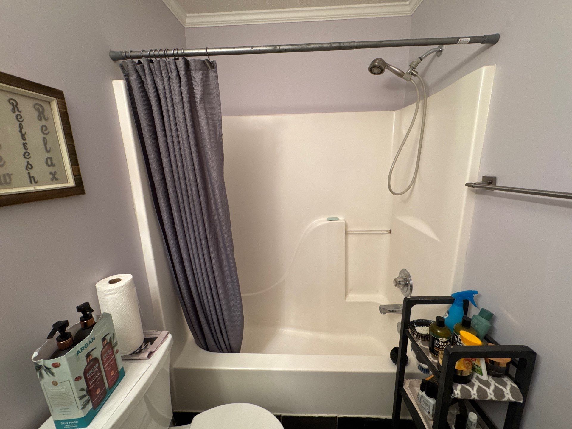Guest bathroom tub and flooring by Prudencio