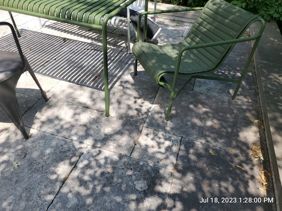 marble patio cleaning and sanding using Polysweep polymeric sand by Northern Power Washing LLC.