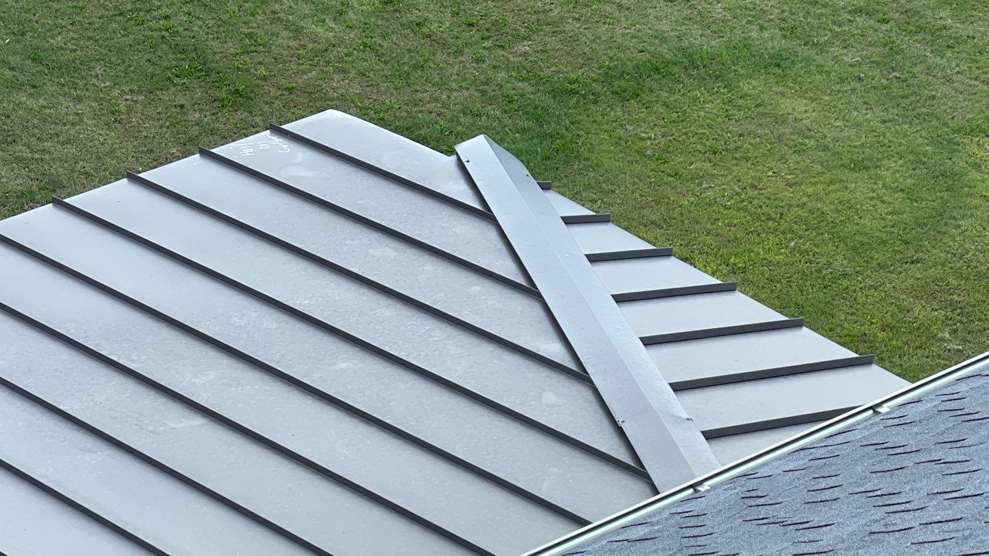 Roof Damage using Certainteed Lifetime Roofing System- Moire Black Landmark Pro shingkes with shadow ridge caps. by BulletpROOF Exteriors