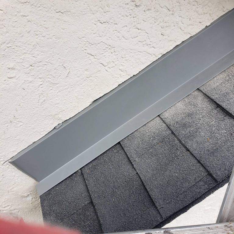 New Roof & Gutters by Island Roofing Inc.