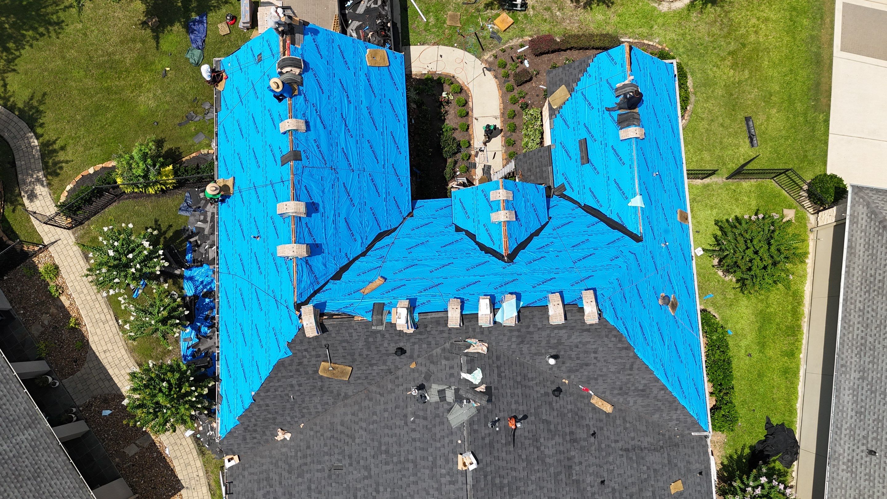 Residential Roofing Installation using Certainteed Landmark after last year's tornado in Cypress by Core Four Roofing
