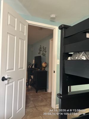 Denver Bedroom Renovation With New Ceramic Tile and Modern Hardware