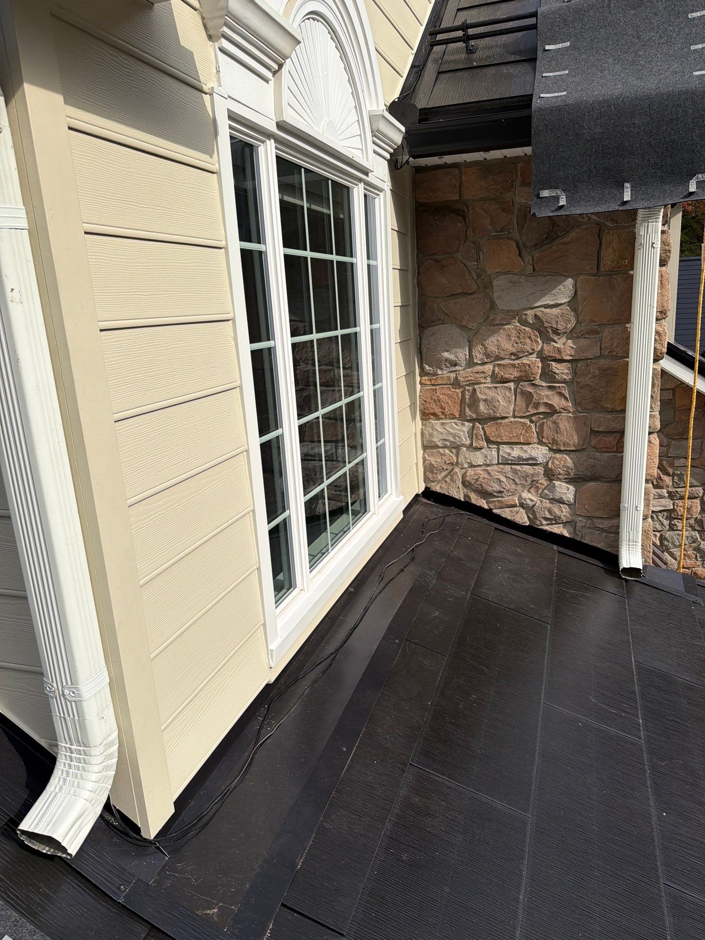 Beautiful James Hardie Siding & Tesla Solar Roof by American Home Contractors