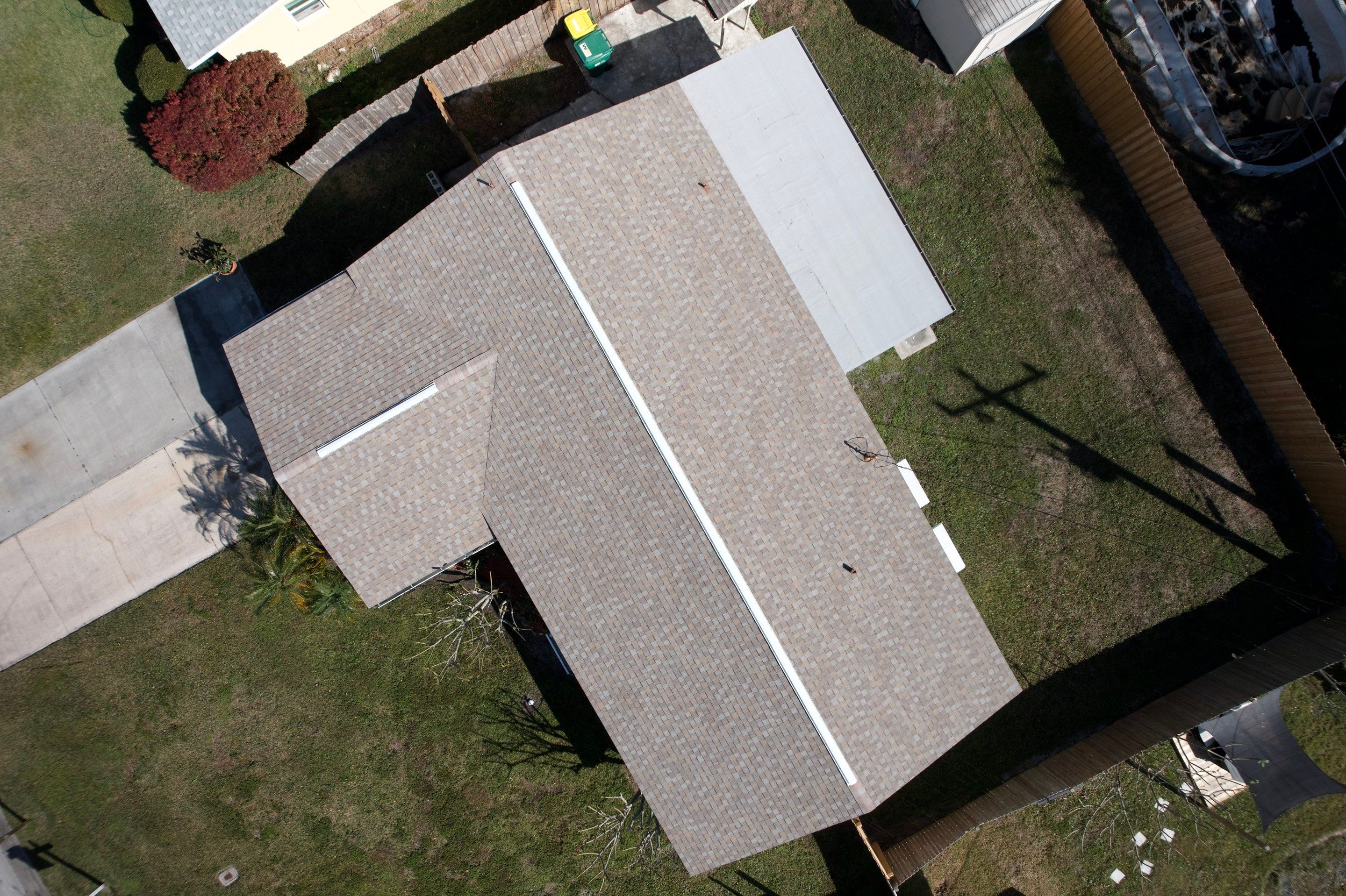 Complete Asphalt Shingle and Flat Roof Replacement in Merritt Island by Wiedmann Construction & Roofing