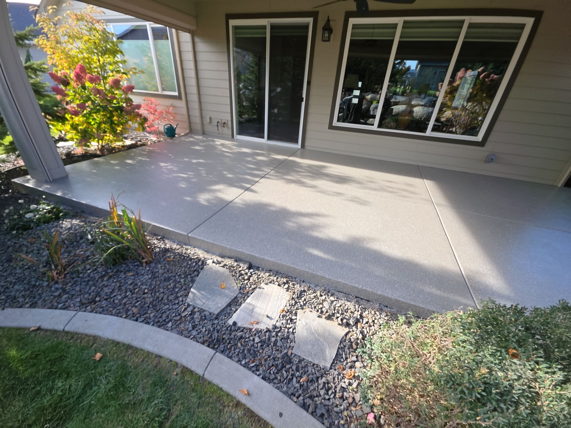 Front Porch and Back Patio Concrete Transformation in Liberty Lake by Croc Coatings, LLC