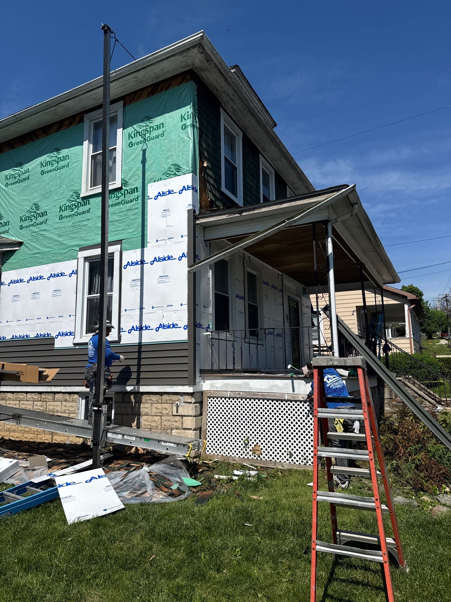 New siding & New Gutters by Alpha Design Services