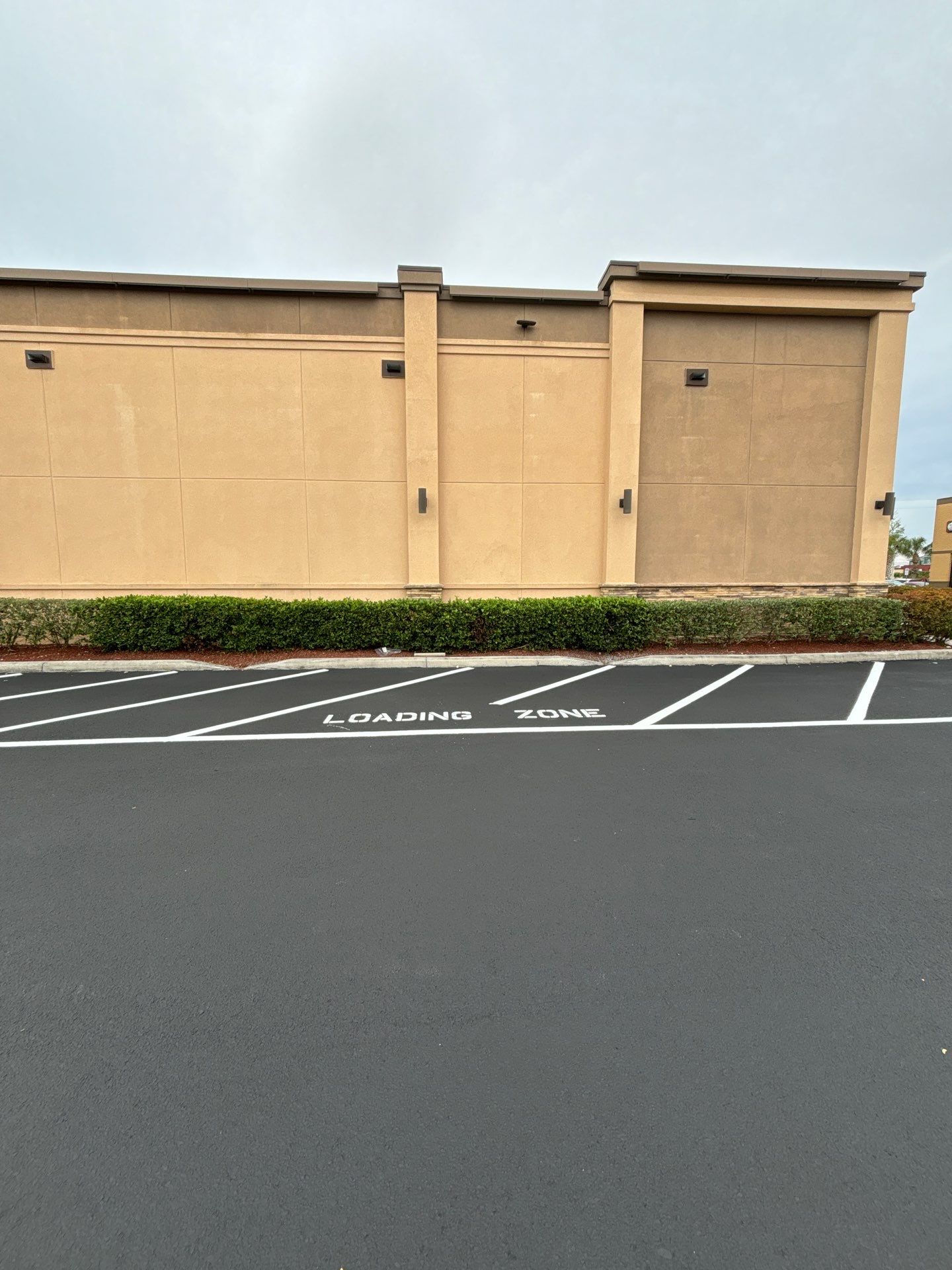 Brighter, Safer, Better: ABC Fine Wine & Spirits Parking Lot Makeover by Everline Coatings & Services - Southwest FL