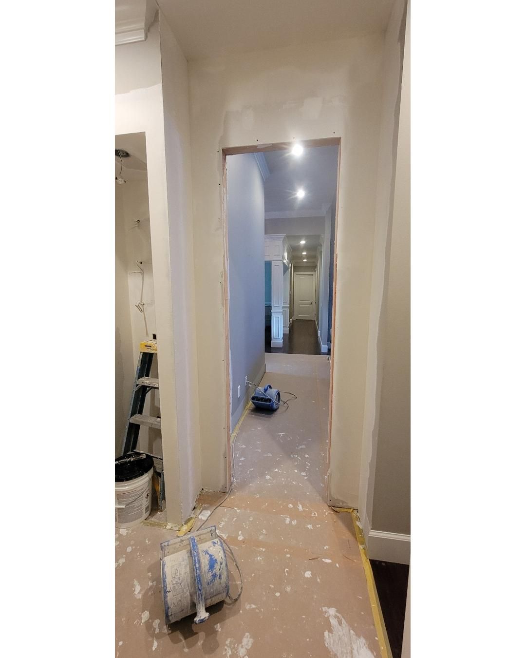 Closet transformation to coffee nook with custom shelves and LED lighting.  by Crm Services Llc