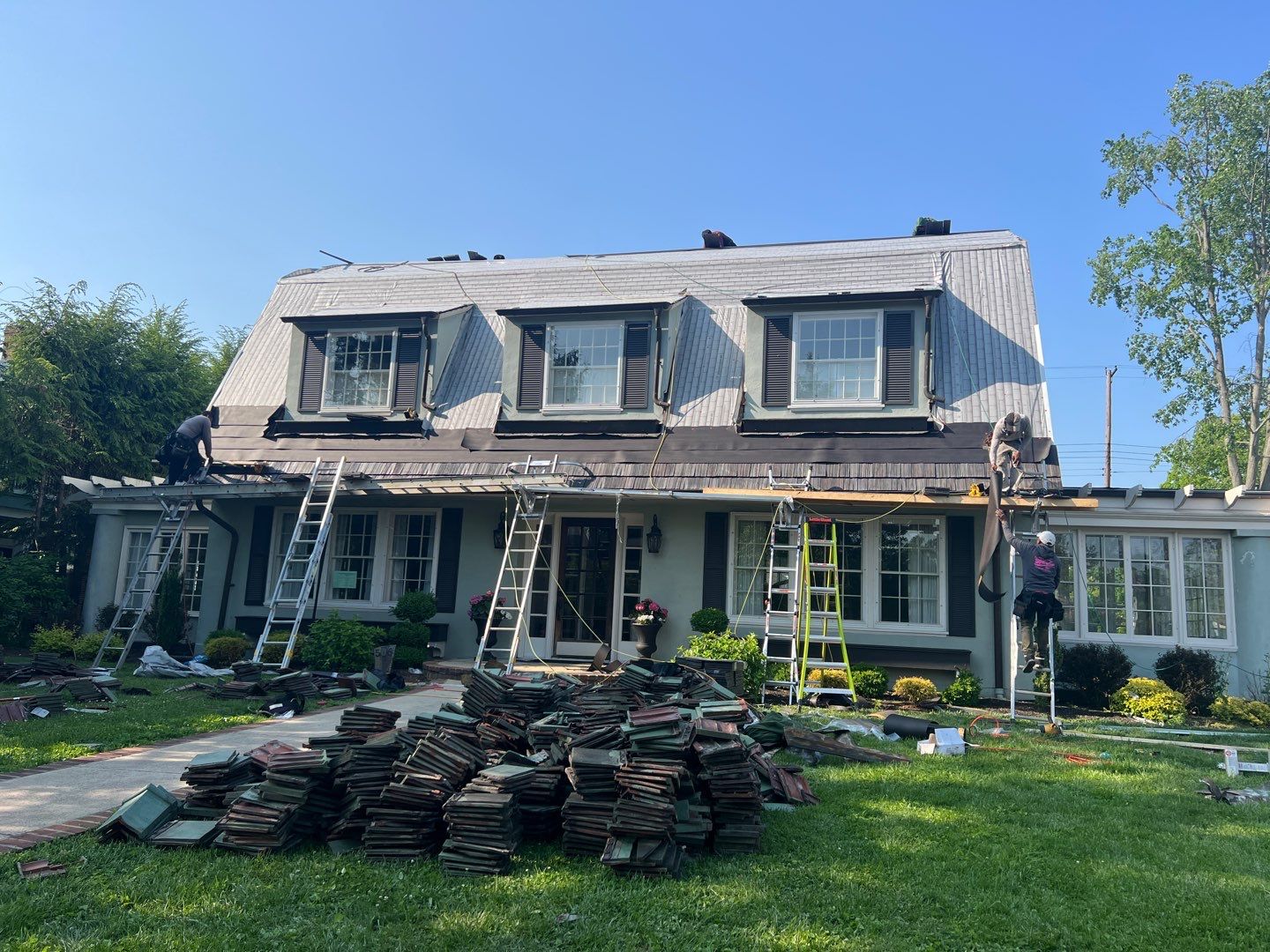 Slate removal/Cedar Shake replacement by Storm Contracting 