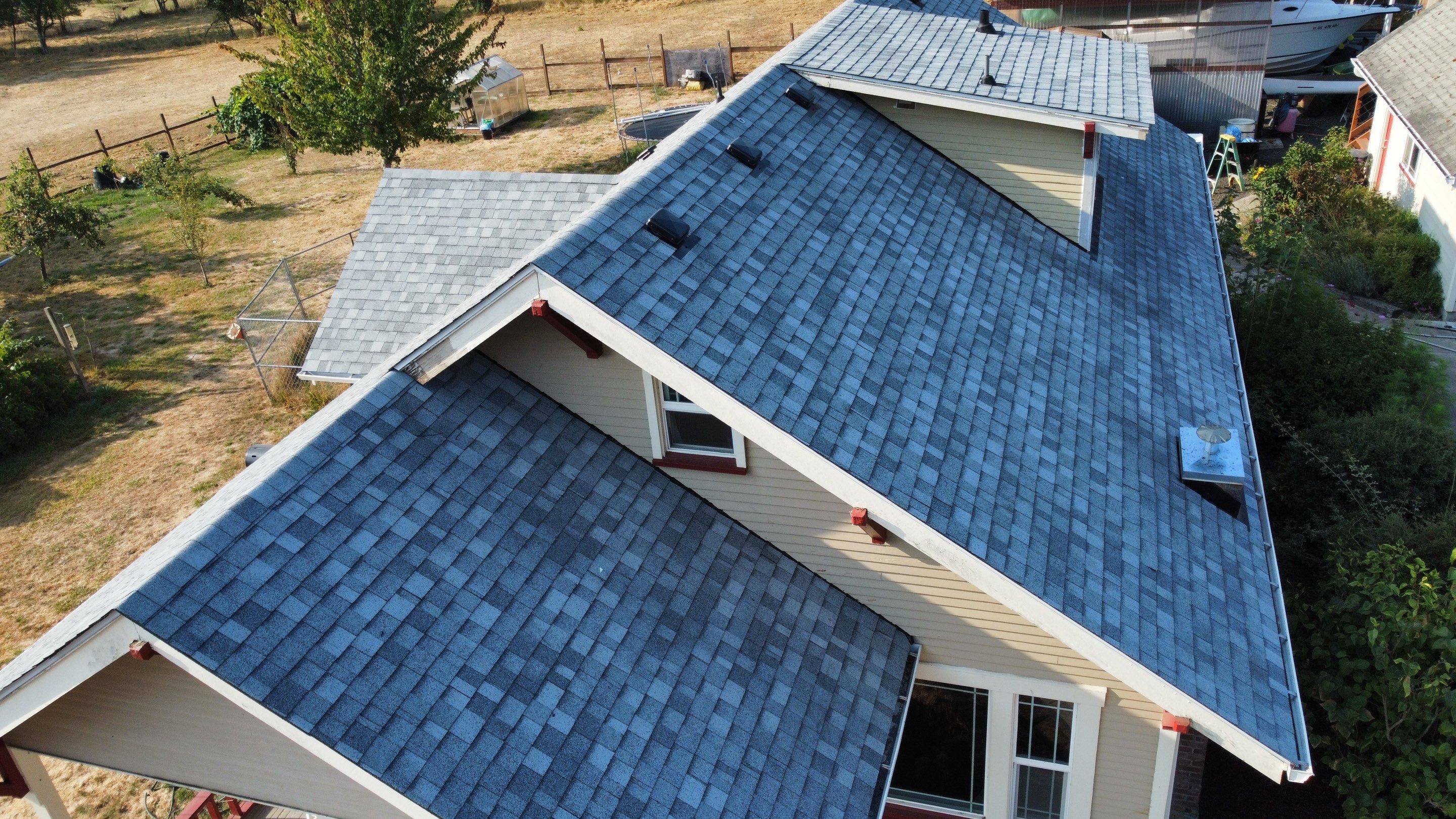 Residential Roofing Installation using IKO Dynasty (Color: Frostone Grey) by Orezona Building & Roofing Company, Inc.