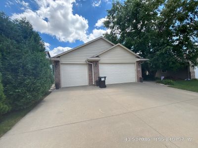 Sioux Falls Exterior Siding Replacement and Custom Deck Upgrade