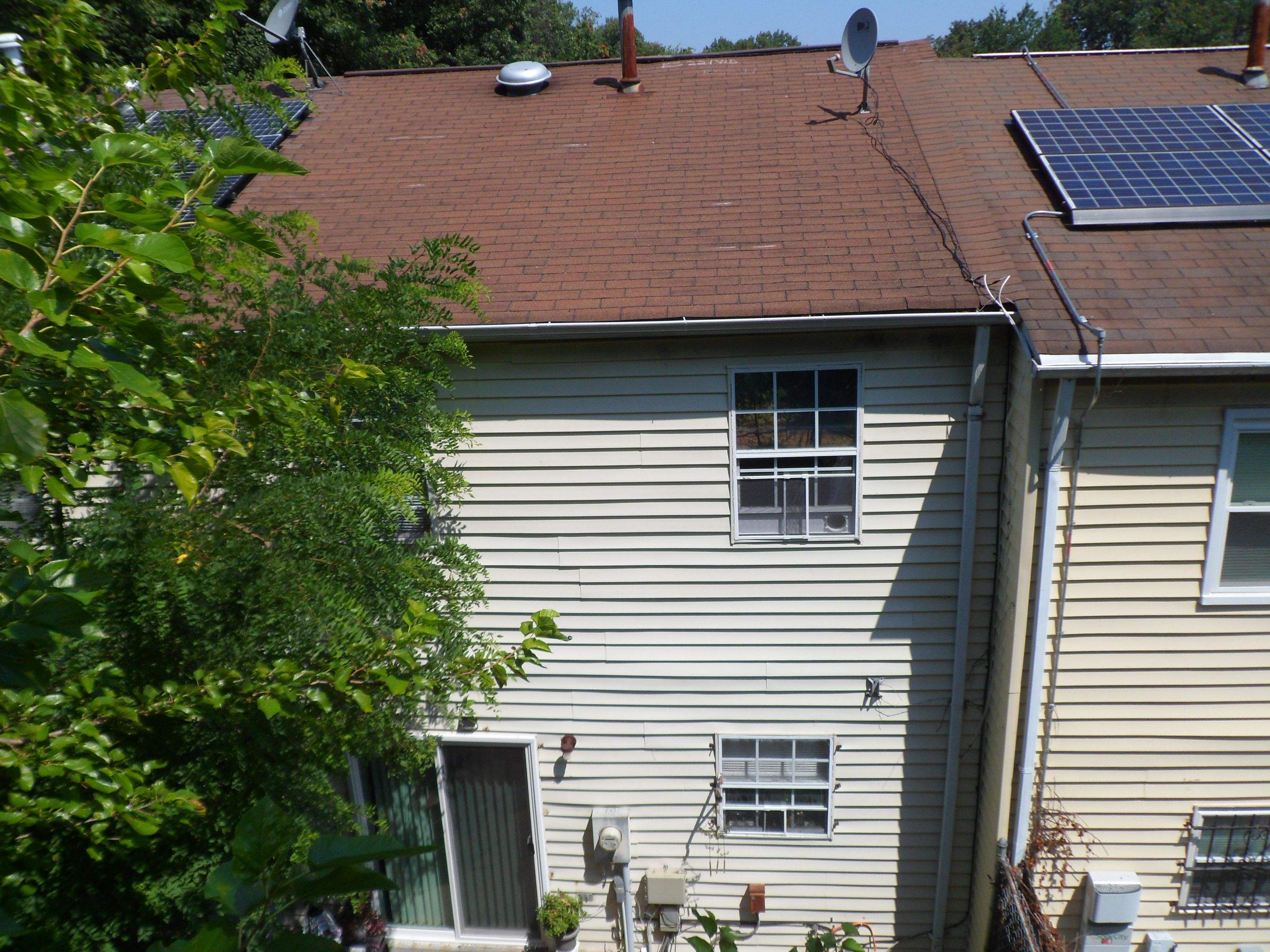 Residential Roofing Installation using Landmark Shingles Color Weatherwood by Alpha Design Services