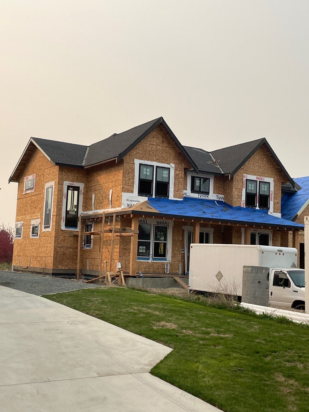 Residential Roofing Installation using OC Oakridge shingles with prolok accent roofs by Top Notch Roofing Inc