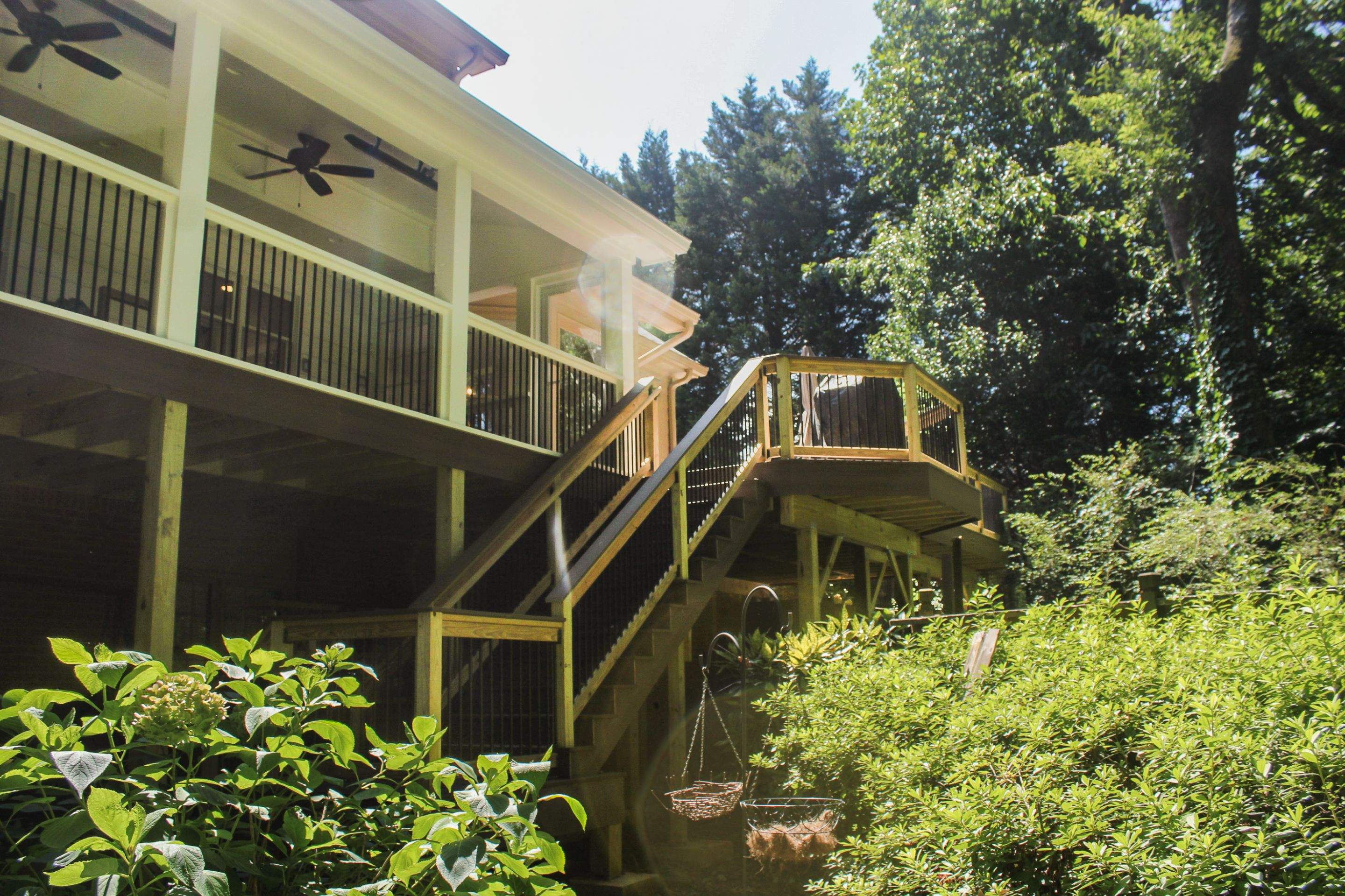 Deckorators Voyage Deck and Shed Style Covered Porch Build with Drink Rail by Nelson Exteriors 