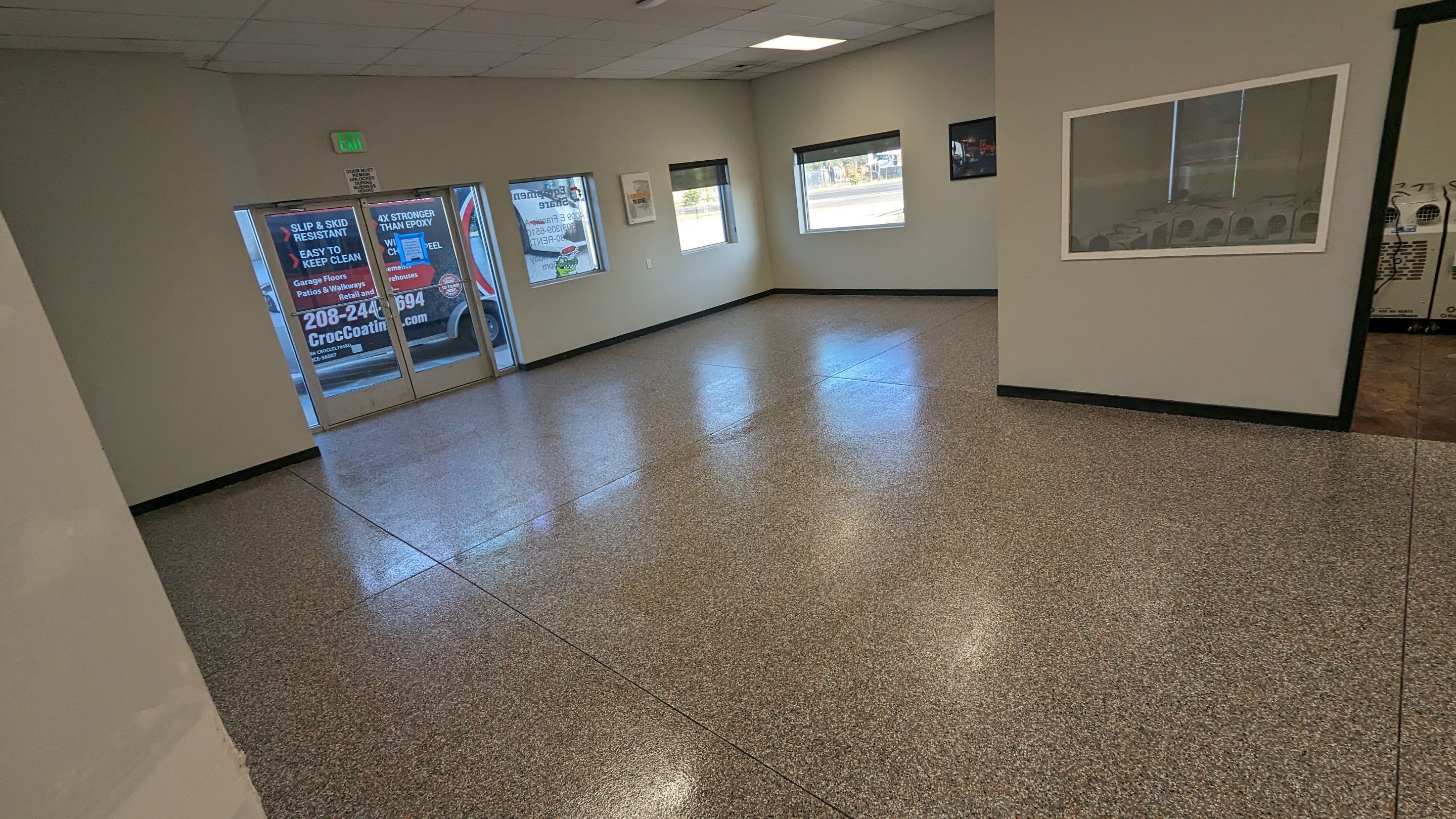 Equipment Share Commercial Floor Transformation using Smoke w/ 5% Orange by Croc Coatings, LLC