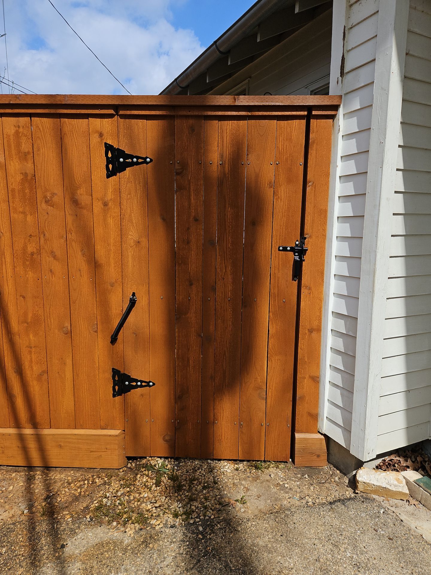 Durable Fence & Gate Installation with Premium Stain by Tim's Fences