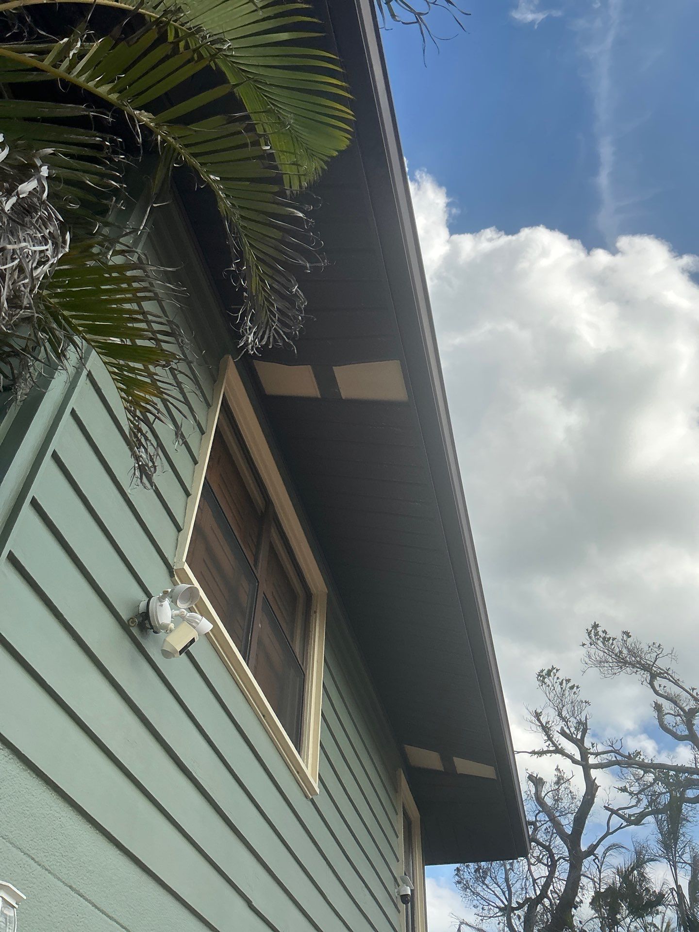 White Soffit and Fascia Installation in Longboat Key FL by Gutter Professors