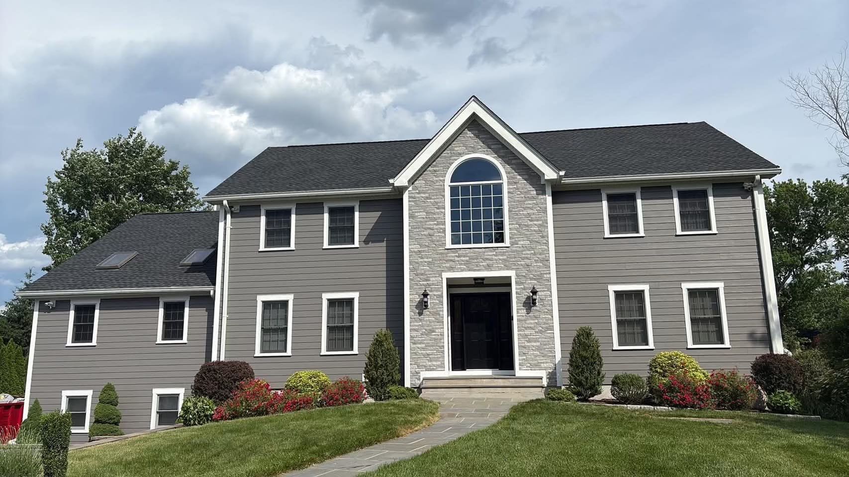 Valhalla Home Exterior Siding Remodel and Custom Window Trim Installation by Ideal Siding 