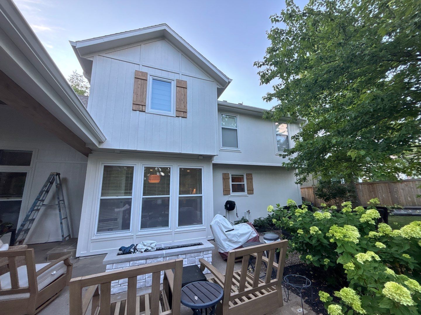 Shoji White Exterior Painting and Comprehensive Wood Rot Repair in Overland Park by Cougar Painting