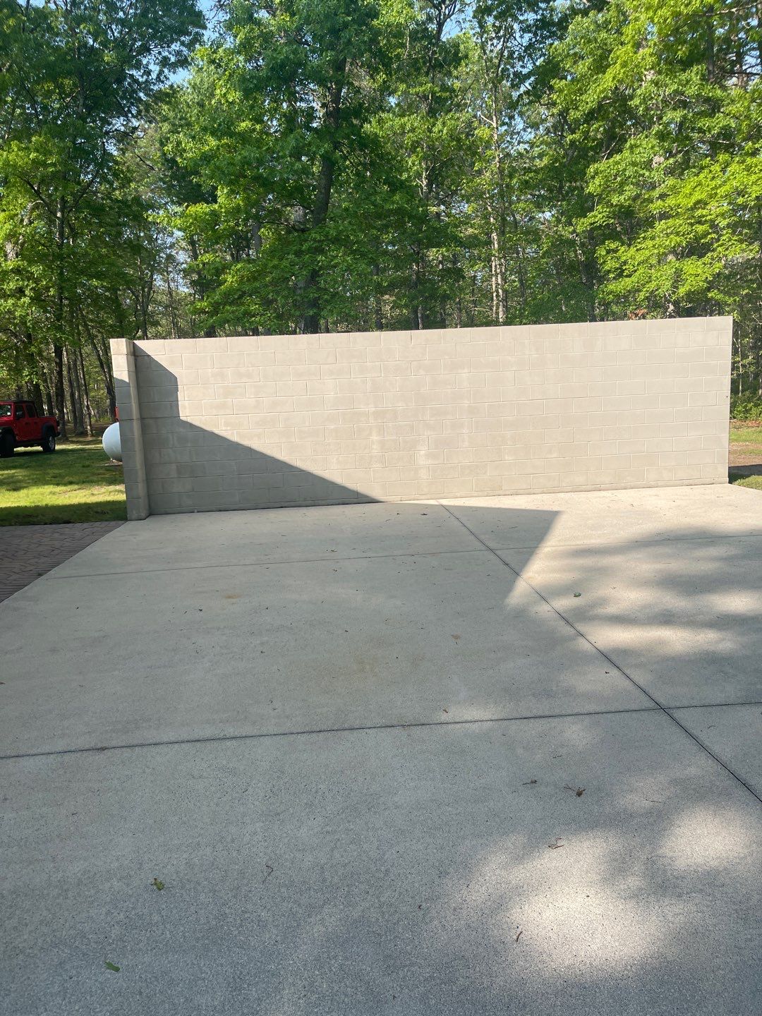 Pavers Cleaned, Garage and Concrete walls by SJ Exterior