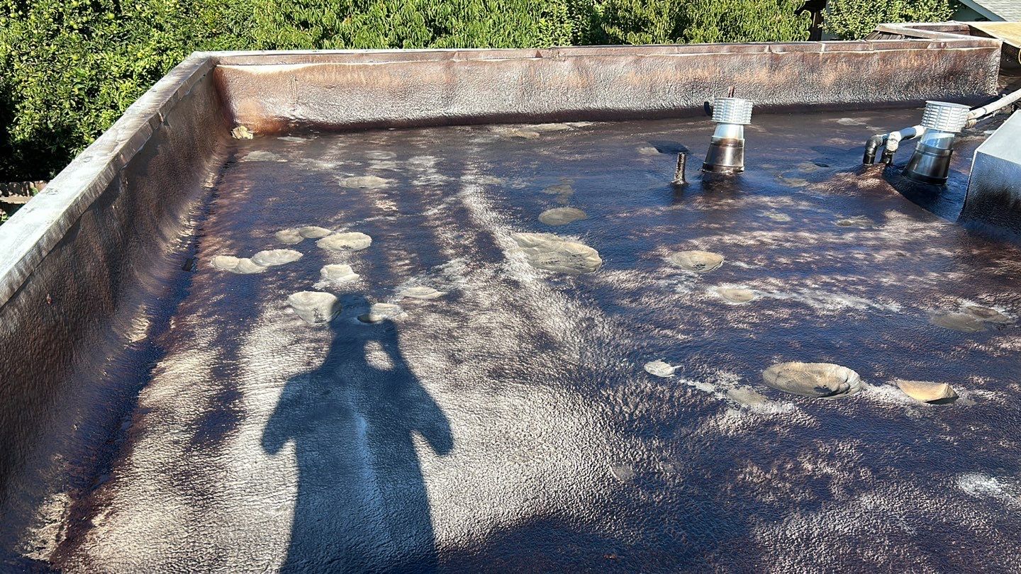 Foam Refurbish using Conklin Benchmark/PUMA XL coatings and spray foam; Also metal roofing around parapet wall by Straight Edge Roofing Inc