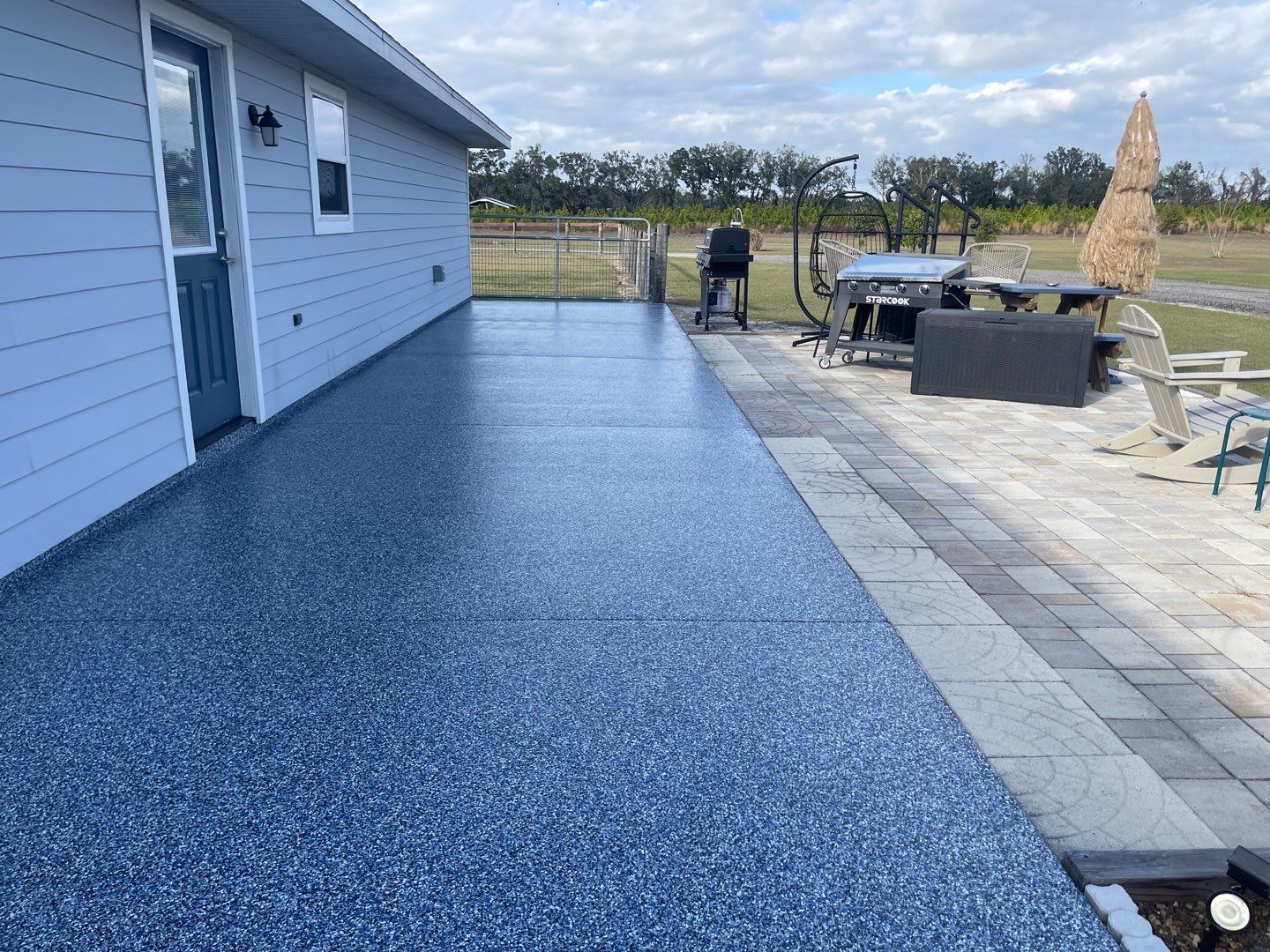 Patio in Trenton, FL in Denim by Cross Creek Concrete Coatings