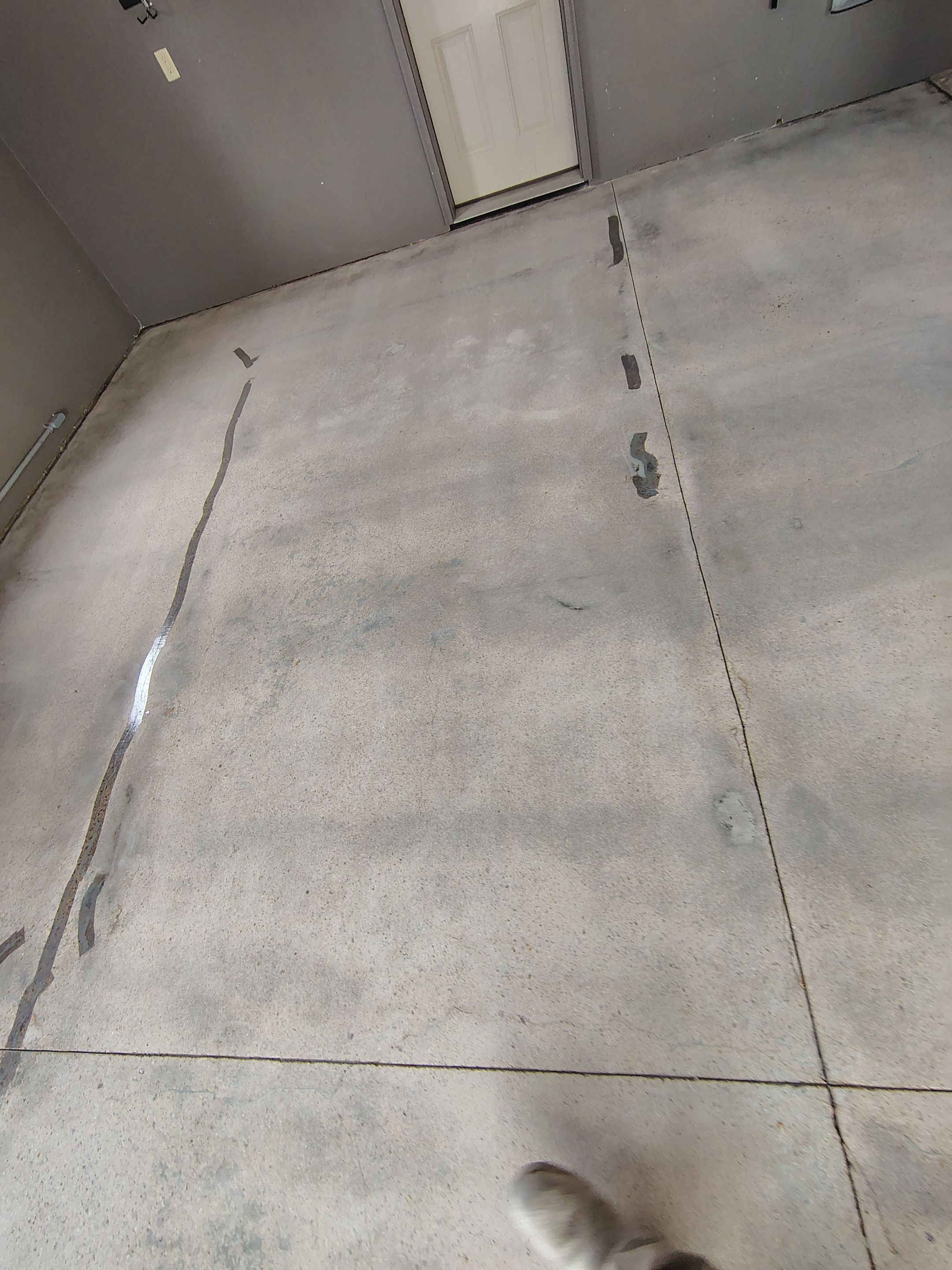 Garage Floor Concrete Coating and Crack Repair in Sioux Falls by Select Painting, Coatings & Garage Cabinets