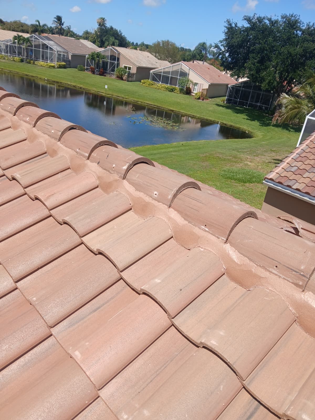 New Barrel Tile Roof Installation and Decking Repair in Boynton Beach by Aastro Roofing