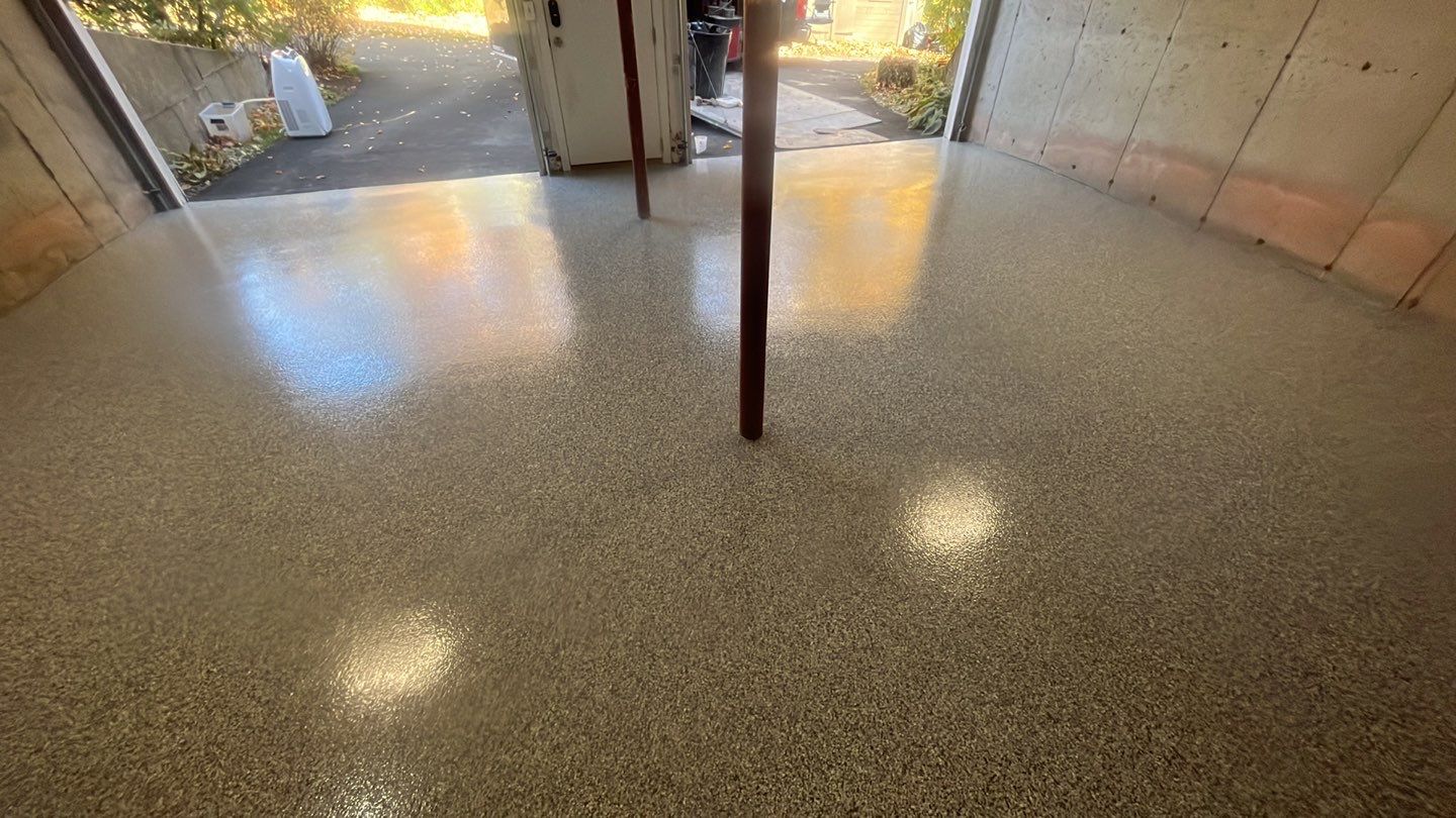 Garage in Londonderry, NH 03053 by Symphony Concrete Coatings