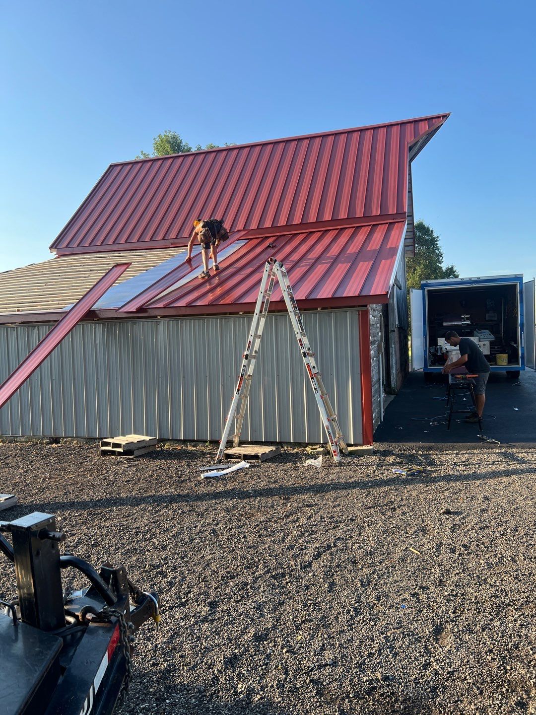 Residential Roofing Installation using Standing Seam Metal - Barn Red by RoofX 