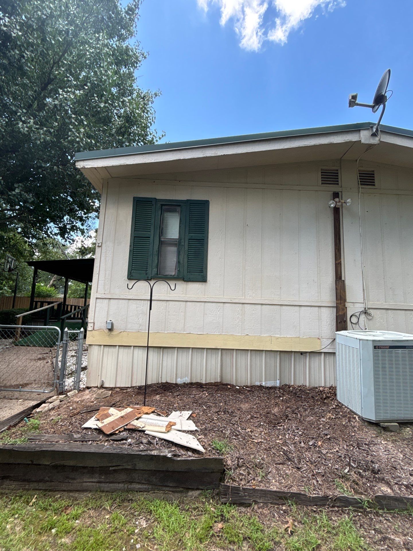 Full Exterior Revamp with Fence Staining in Flint, Texas by Quality Coats Painting