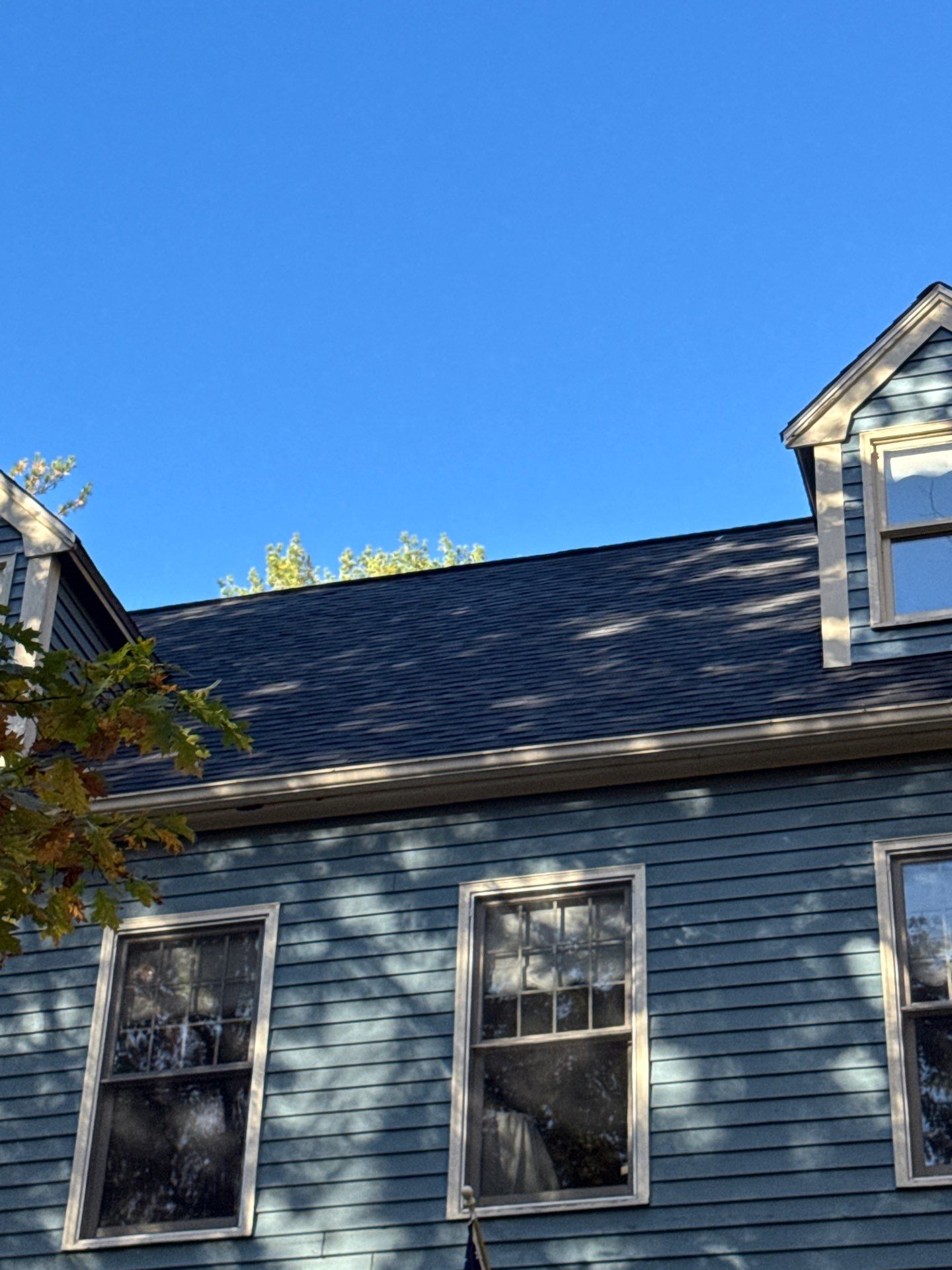 Milford Complete Roof Replacement with Velux Skylight Upgrade by Mighty Dog Roofing of Greater Middlesex County