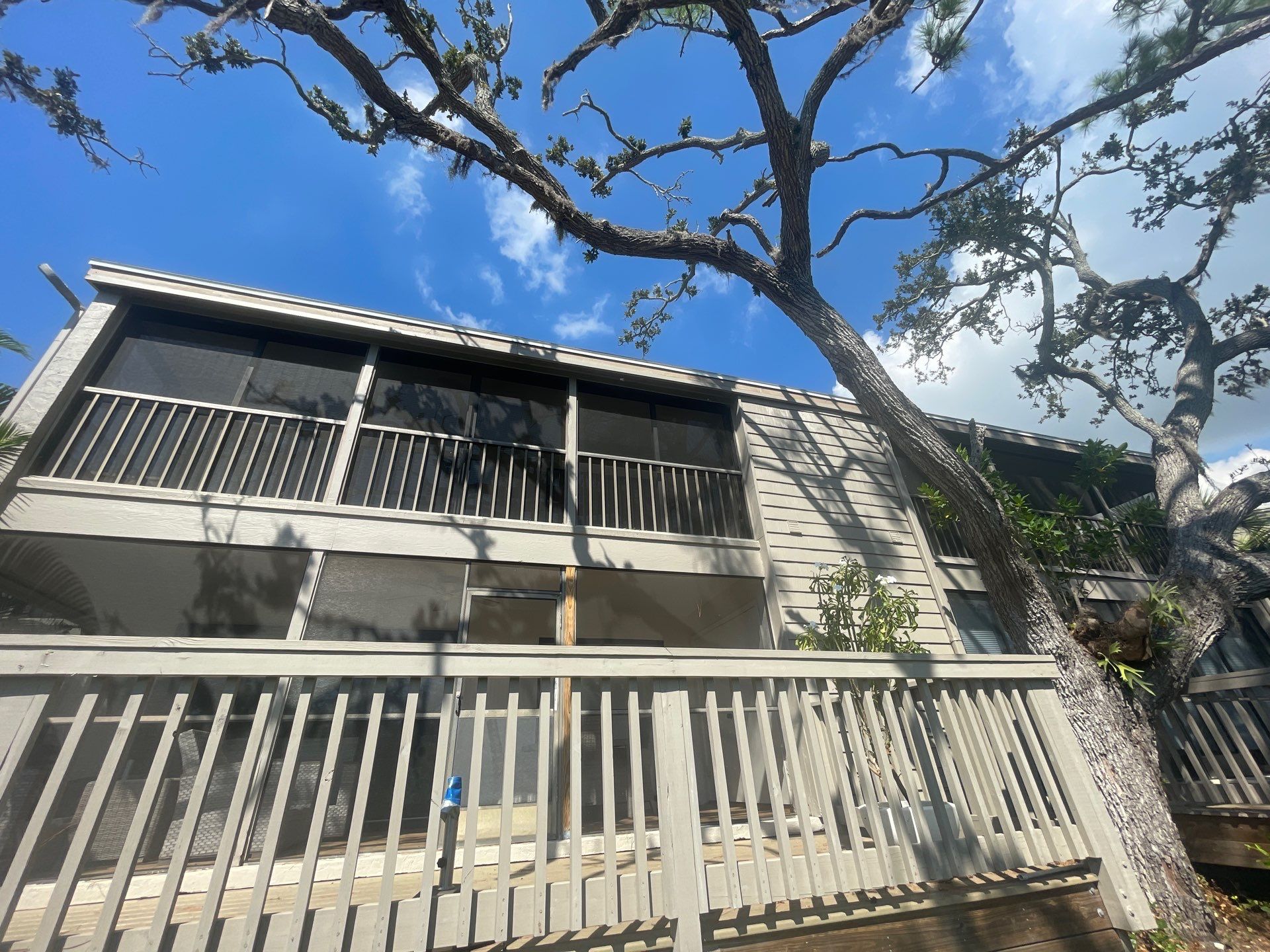 White Gutters Repair and Installation in Sarasota FL by Gutter Professors