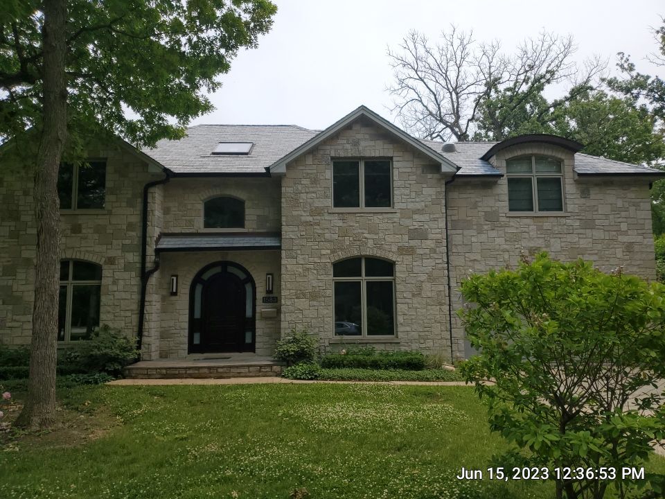 Highland Park, IL Bluestone, concrete,  Trex deck cleaning by Northern Power Washing LLC.