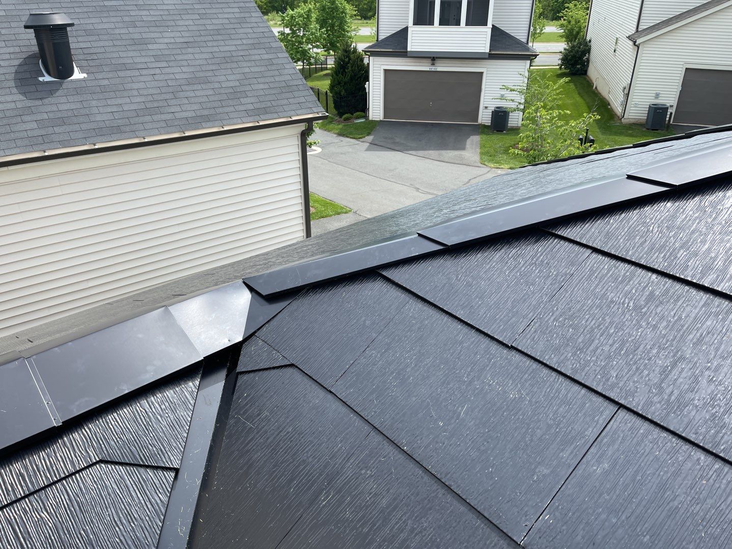 Tesla Solar Roof using Tesla Solar Roof V3 tiles by American Home Contractors