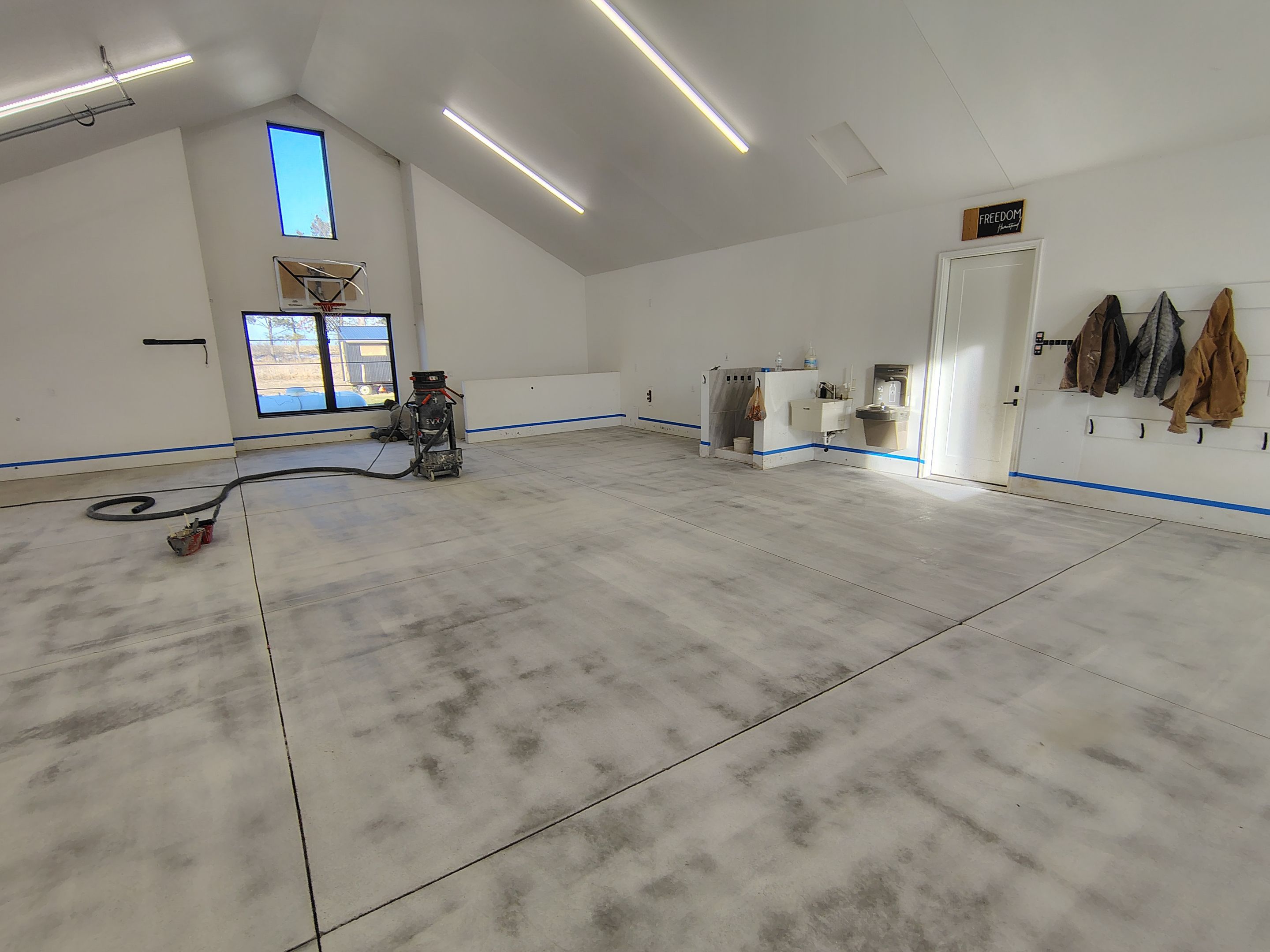 Epoxy Flake Garage Floor and Stair Coating in Sioux Falls by Select Painting, Coatings & Garage Cabinets