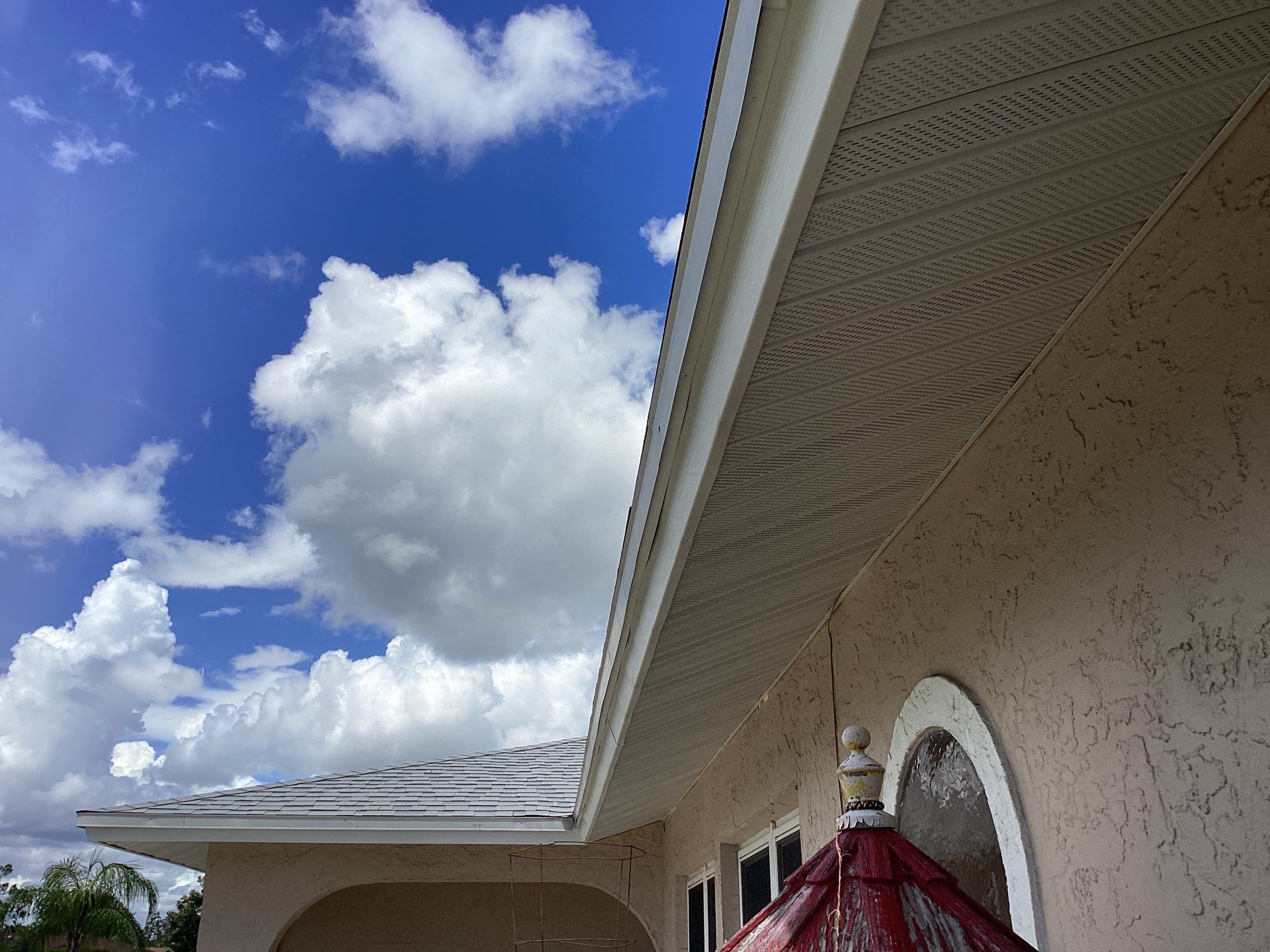 White Seamless Gutters and Splash Guards in Fort Myers FL by Gutter Professor by Gutter Professors