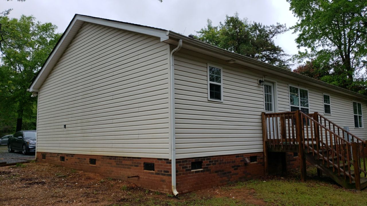 House Wash using cleaner by Power Wash Masters LLC