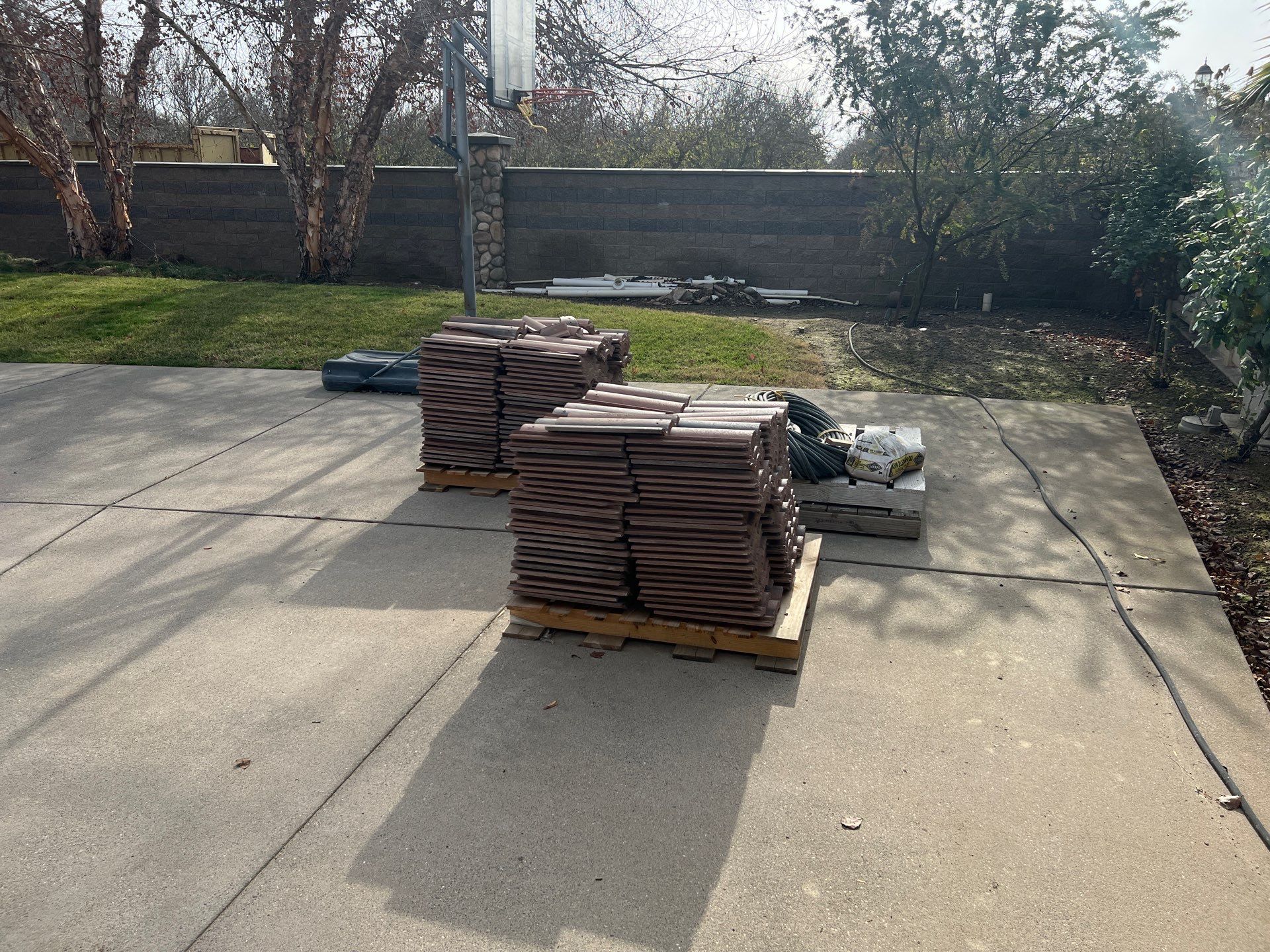 Tile, Metal, and TPO roofing project (new construction) by Straight Edge Roofing Inc