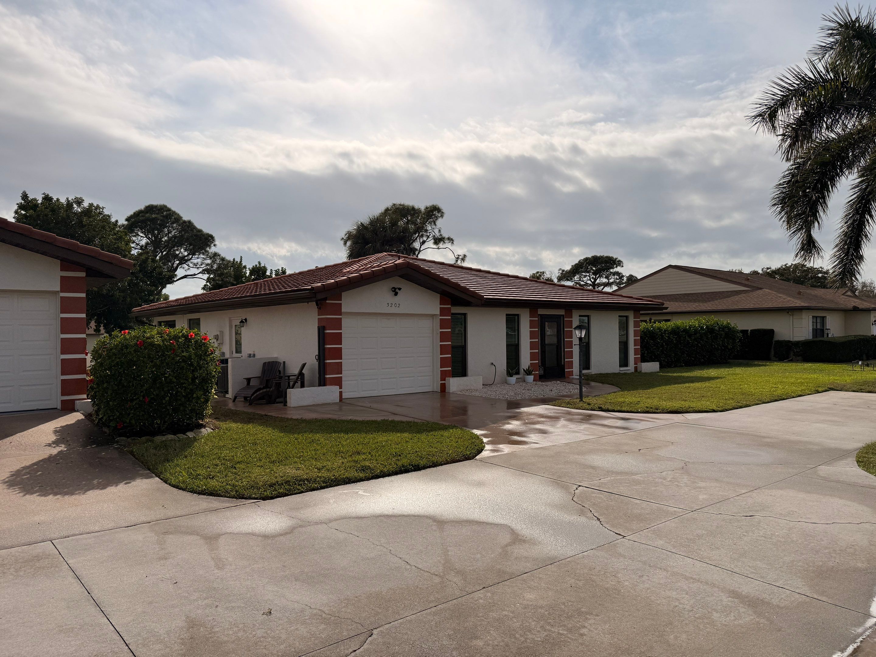 Neighboring Tile Roof Cleanings in Vivienda at Bradenton I – Bradenton, FL by Sunshine AquaWash