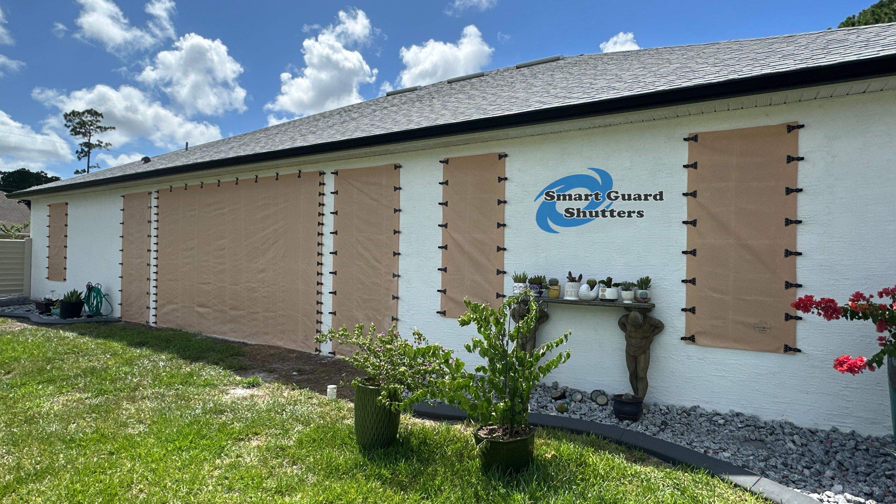 AstroGuard Hurricane Fabric in Tan by Smart Guard Shutters
