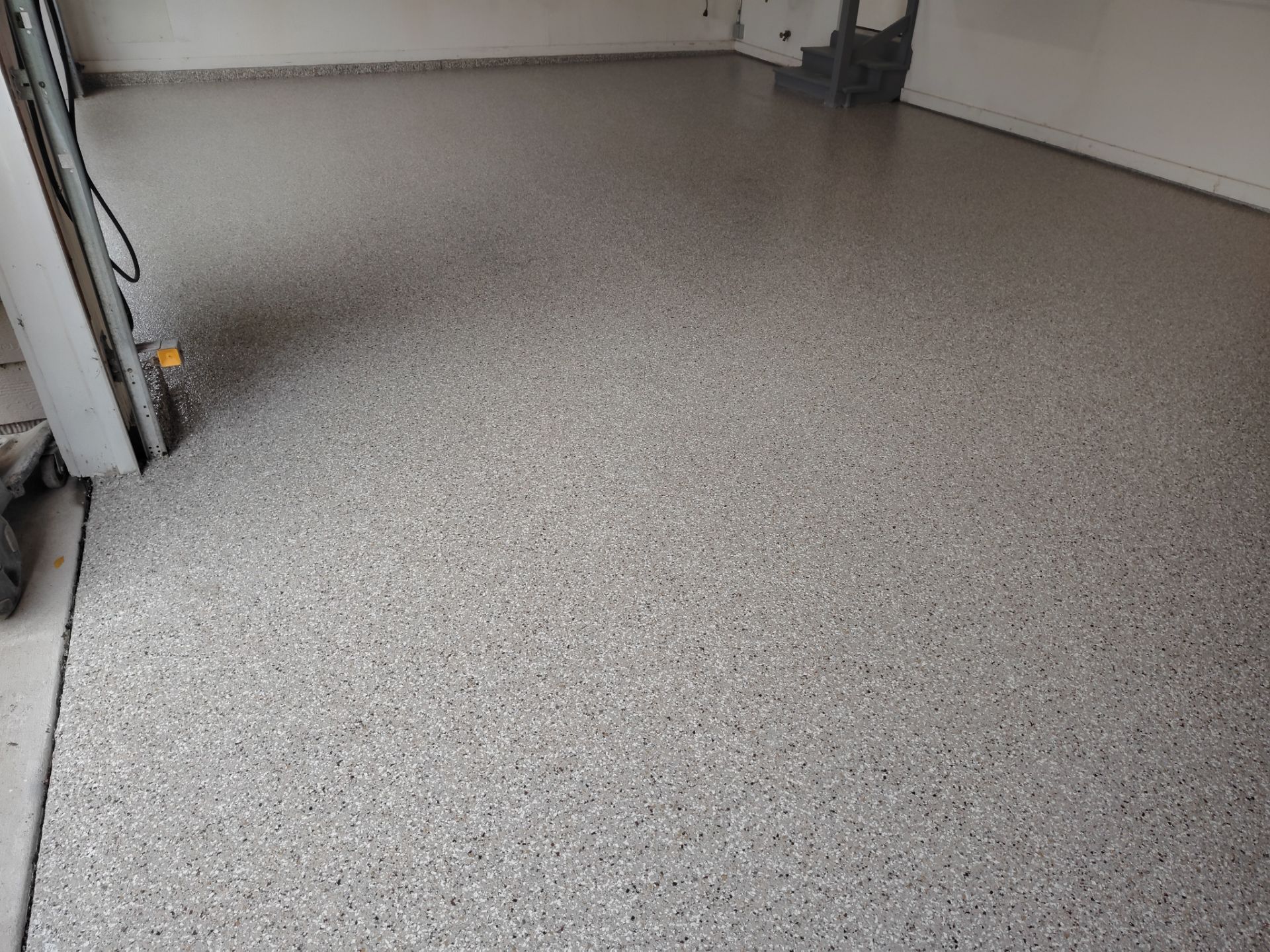 Residential Garage Floor Coating and Concrete Repair in Johnston by Revival Concrete Coatings