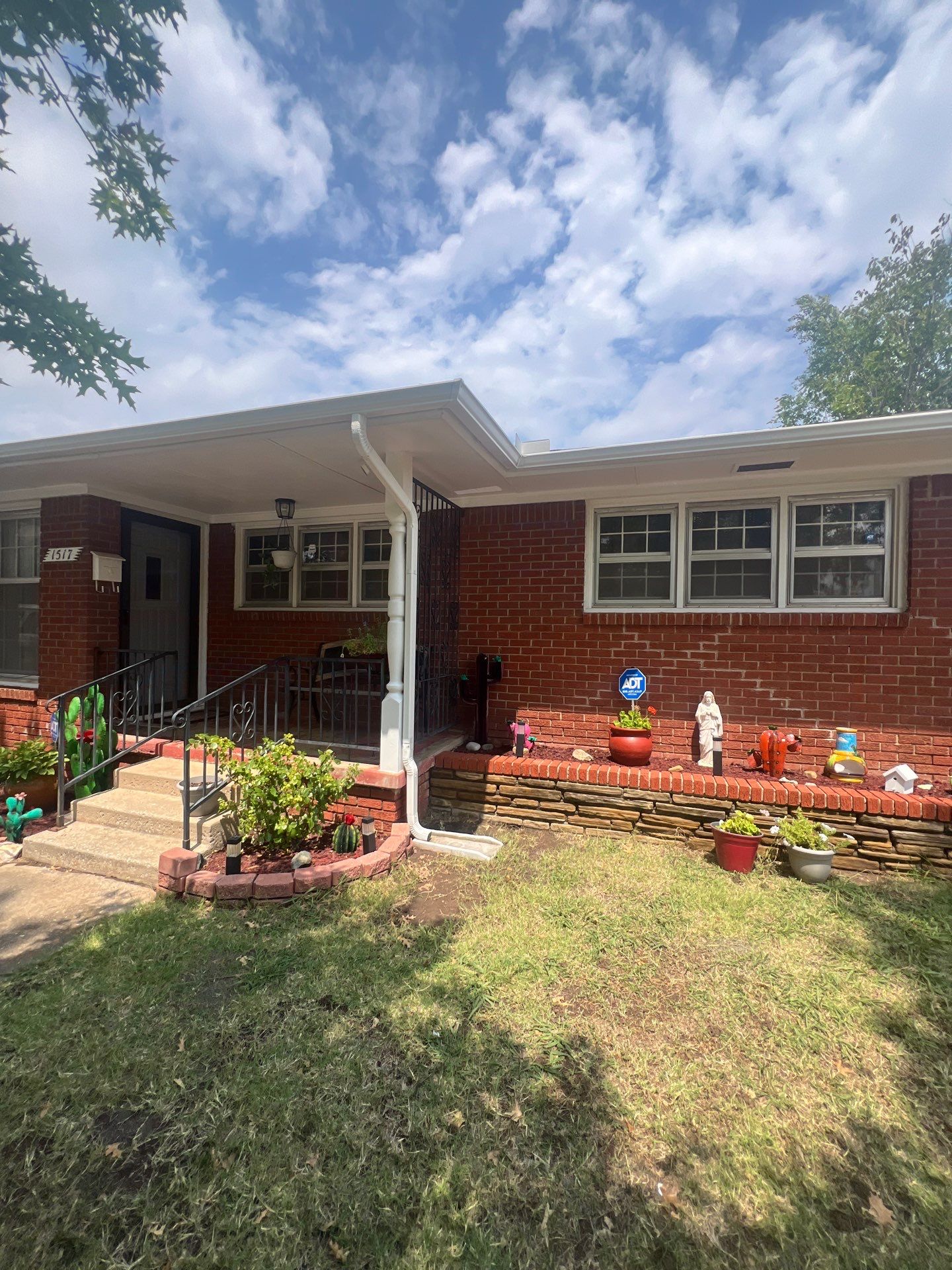 Roof Replacement and Gutter Installation in Oklahoma City, OK by McCann's Roofing and Construction